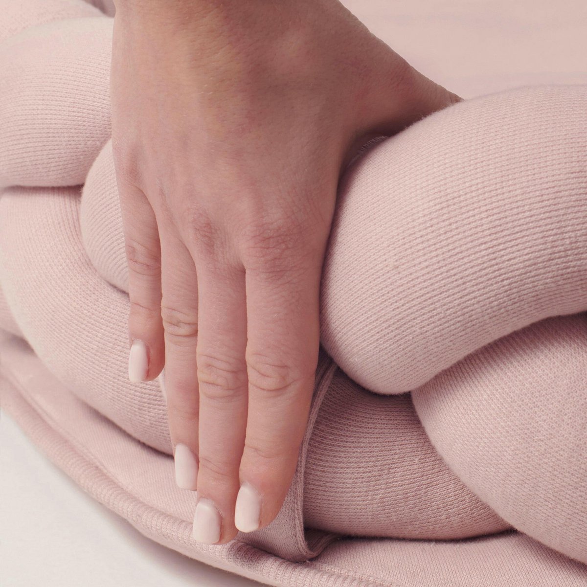 Pink braided cot bumper